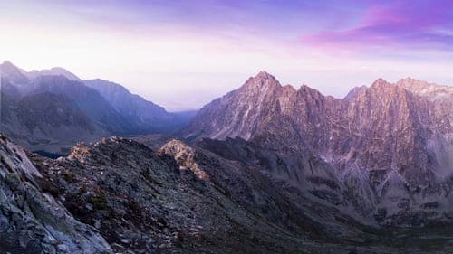 A misty mountain sunset shared as a TalksTry status update